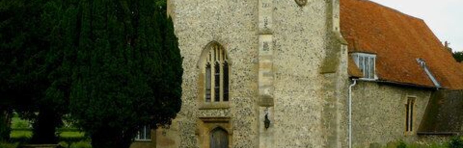 Bucklebury - St Mary The Virgin Bucklebury Church has the finest Norman entrance in the county and one of the best to be seen anywhere in England. Carved around 1150, it depicts row upon row of chevrons, rosettes, faces and flowers. It is topped by a strange bearded mask crowned with an orb and cross.
