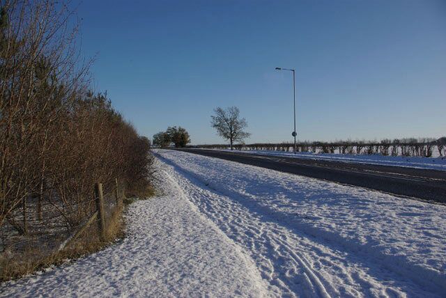 A1303 near Bottisham The A1303 was once the A45, but the road is now by-passed by the A14. The carriageway is clear in this view, but the footpaths are treacherous.