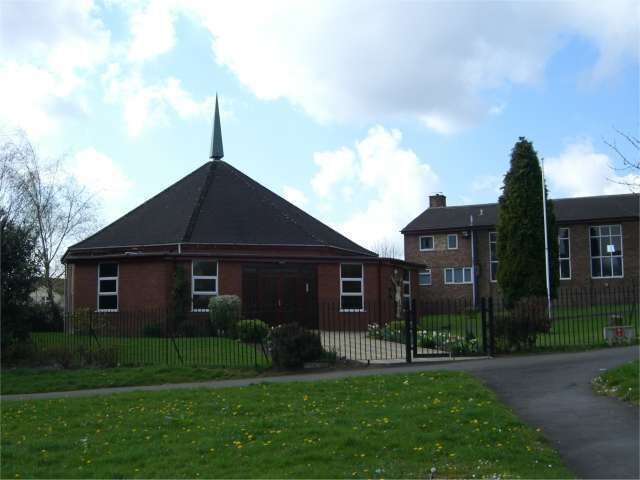 St John the Evangelist, Broad Meadow A rather small Catholic Church of unusual shape with, to the right, the much larger Parish Hall.