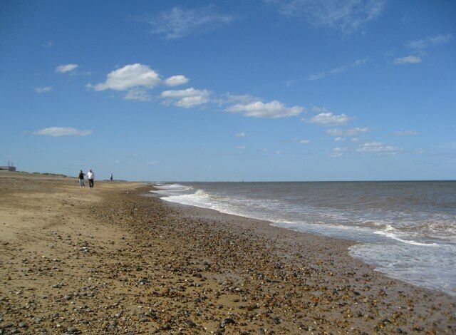 Looking along Sizewell Beach The waves were coming in faster than the photographer thought - I got my feet wet!