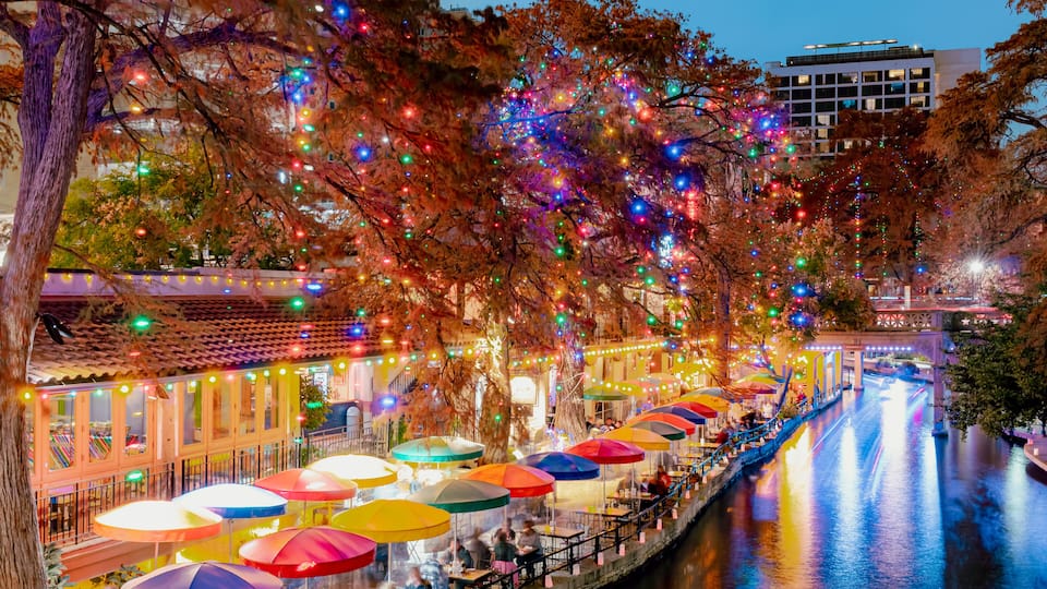 Colorful LED Christmas lights at the restaurants at the San Antonio Riverwalk on a December Texas evening