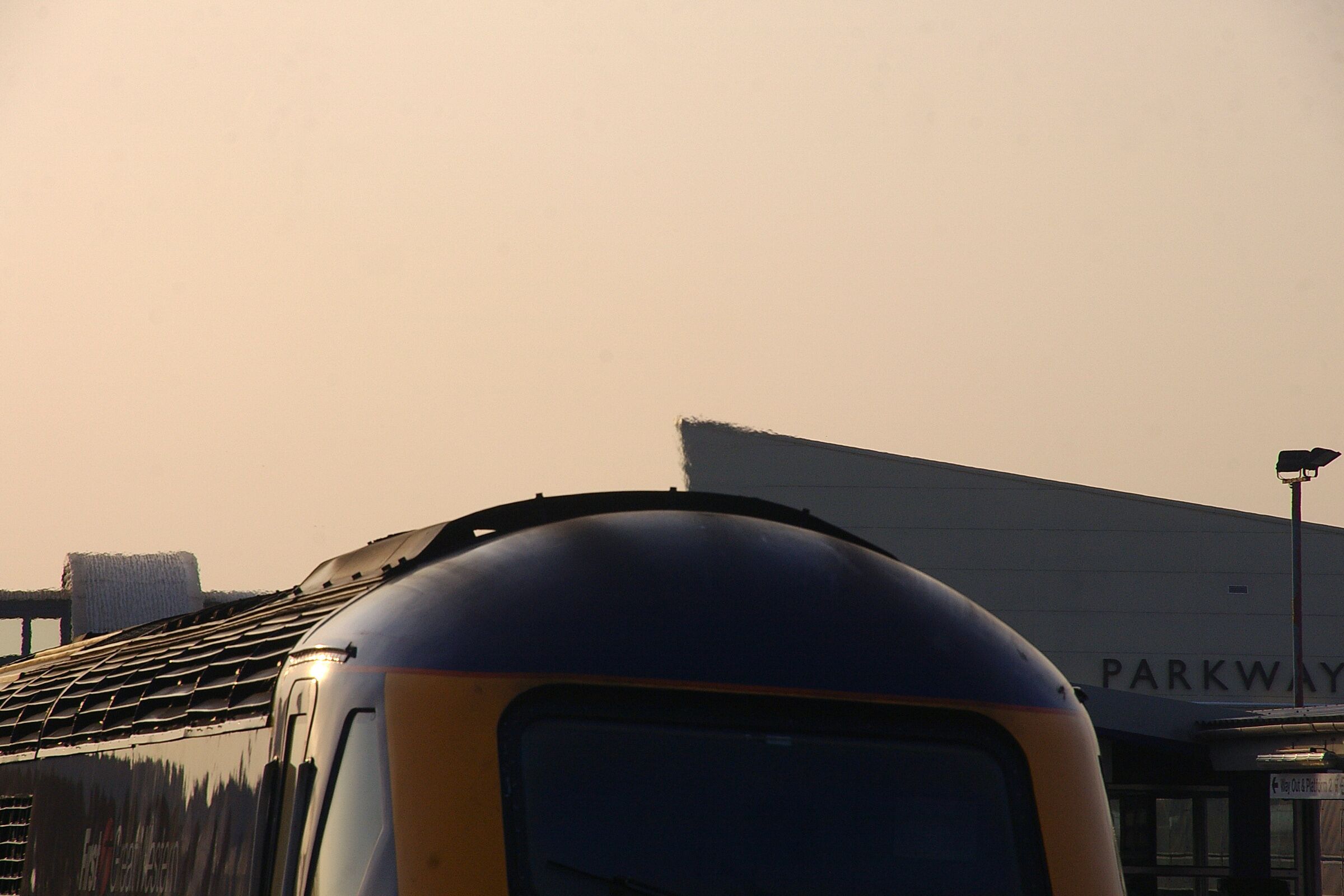 First Great Western 43137 tailing a westbound HST at Bristol Parkway railway station. Detail on the roof and exhaust fumes.
