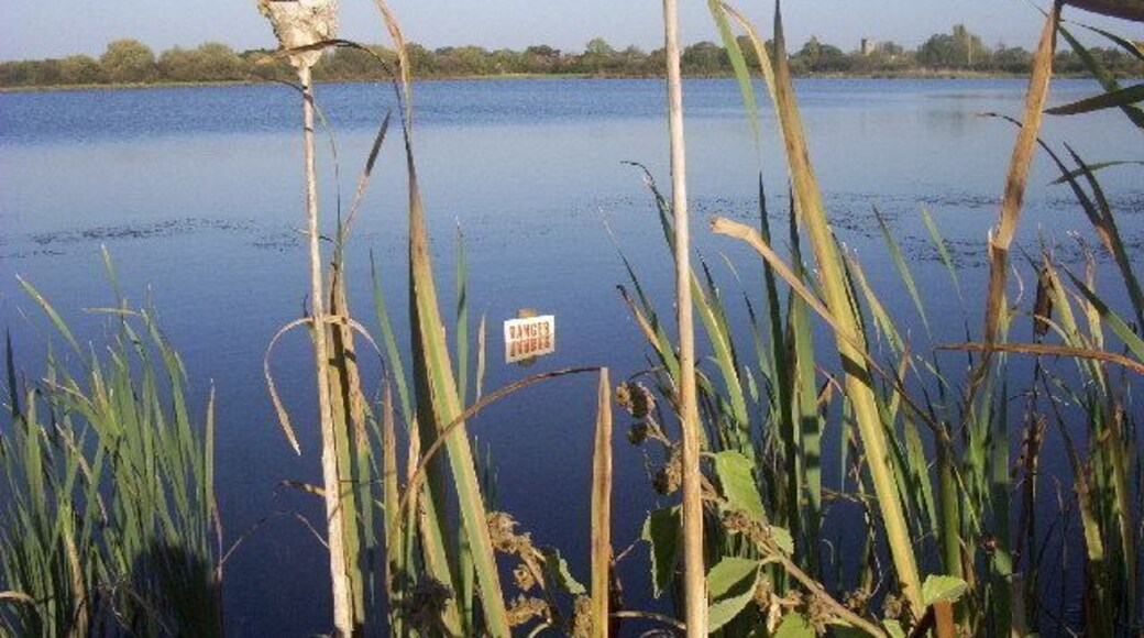 near to Barrow on Trent. View over a now-disused gravel pit south west of Barrow on Trent, now a lagoon used by local and migratory wildlife. Barrow church is in the distance.