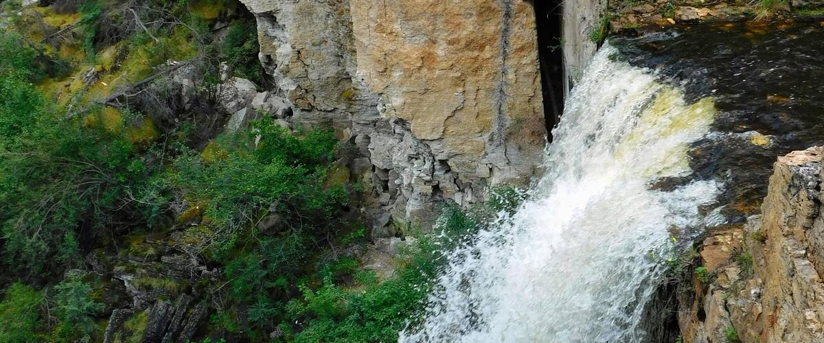 A gorgeous waterfall just off a creek, and right alongside the highway.