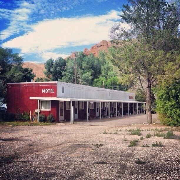 Empty motel in Echo. There are no longer any service in echo, but the following still stand: Motel, strip mall, drive in, & schoolhouse. 