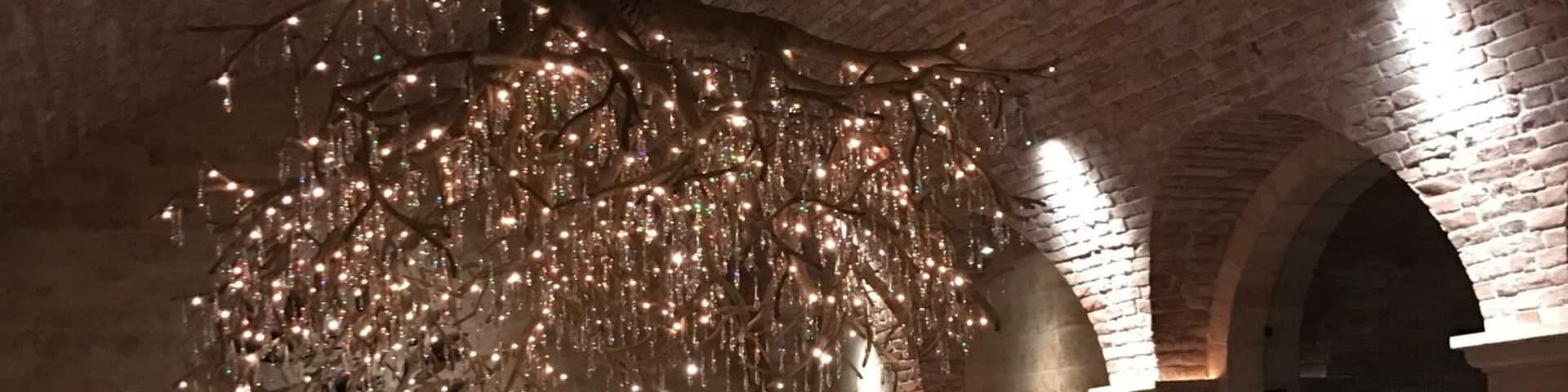 One of the most grand dining rooms ever in the amazing wine cave at Hall Rutherford. The chandelier is out of this world!