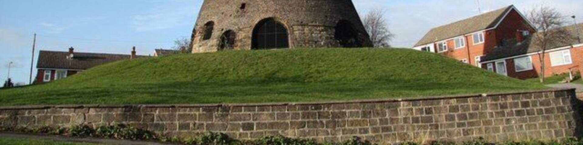 Glassworks cone at Catcliffe, South Yorkshire, England. One of two built in 1740 for William Fenney. The other has not survived. The 70ft-high brick furnace was worked until early in the 20th century. It was used as a prison in the First World War and as a canteen in the 1926 General Strike http://www.treetonweb.co.uk/parish/catcliffeglass.htm
