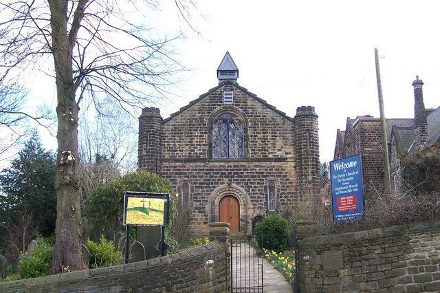Parish church of the Ascension, Church Street, Oughtibridge, South Yorkshire, seen from the north. Built in 1842 and consecrated in 1843 as a Chapel of Ease to Wadsley parish church. In 1939 it was made a separate parish and in 1974 was dedicated to the Ascension of Christ. Originally the turrets on either side each had a pinnacle, but many years ago (1920s?) one was blown off by a gale and the other was removed for safety. Visible on the right of the picture is a part of the original Oughtibridge Junior and Infants School.