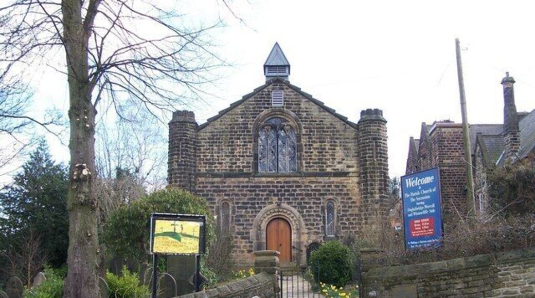 Parish church of the Ascension, Church Street, Oughtibridge, South Yorkshire, seen from the north. Built in 1842 and consecrated in 1843 as a Chapel of Ease to Wadsley parish church. In 1939 it was made a separate parish and in 1974 was dedicated to the Ascension of Christ. Originally the turrets on either side each had a pinnacle, but many years ago (1920s?) one was blown off by a gale and the other was removed for safety. Visible on the right of the picture is a part of the original Oughtibridge Junior and Infants School.
