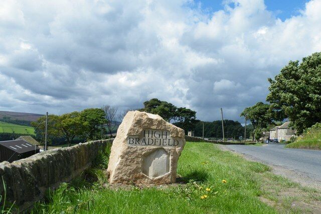 High Bradfield Village Marker Stone. This stone, placed in August 2008, depicts the Watch Tower in High Bradfield's St Nicholas' Church and complements that situated on the approach to Low Bradfield. St Nicholas' Church Tower is just visible in the far distance, just to the right of the stone. 916344