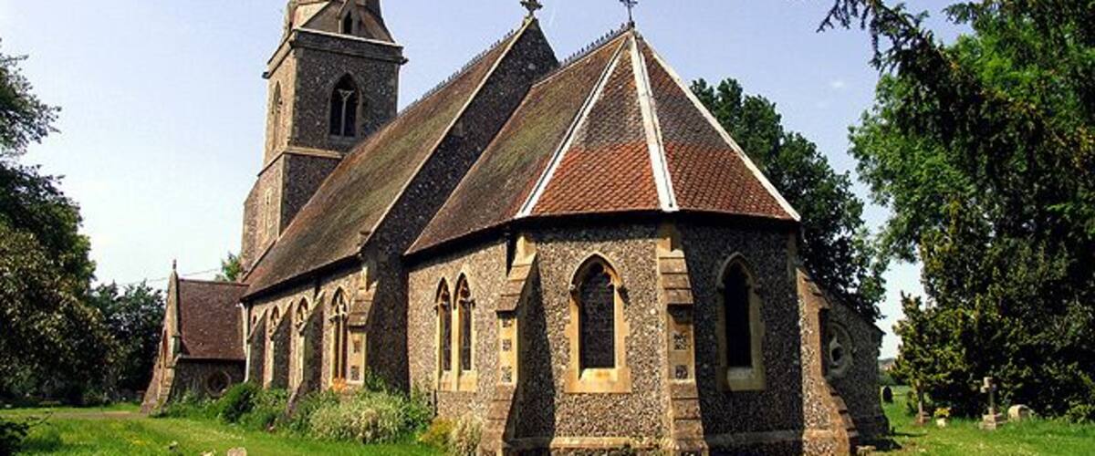 Church of England parish church of St Bartholomew, Arborfield, Berkshire: view from the southeast, showing the spire and the polygonal apsidal chancel