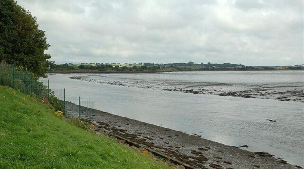 The Eden Estuary Local Nature Reserve. Viewed from the Eden Estuary Centre at Guardbridge, at low tide. There's often a Kingfisher perched on the post in the foreground. For a high tide view in better weather, see 724648. The buildings on the other side, out of the square, are part of RAF Leuchars.