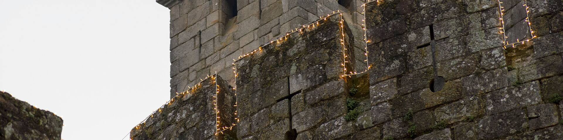 Santa Maria Da Feira Portugal. Illuminated castle tower of Perlim: the Christmas theme park