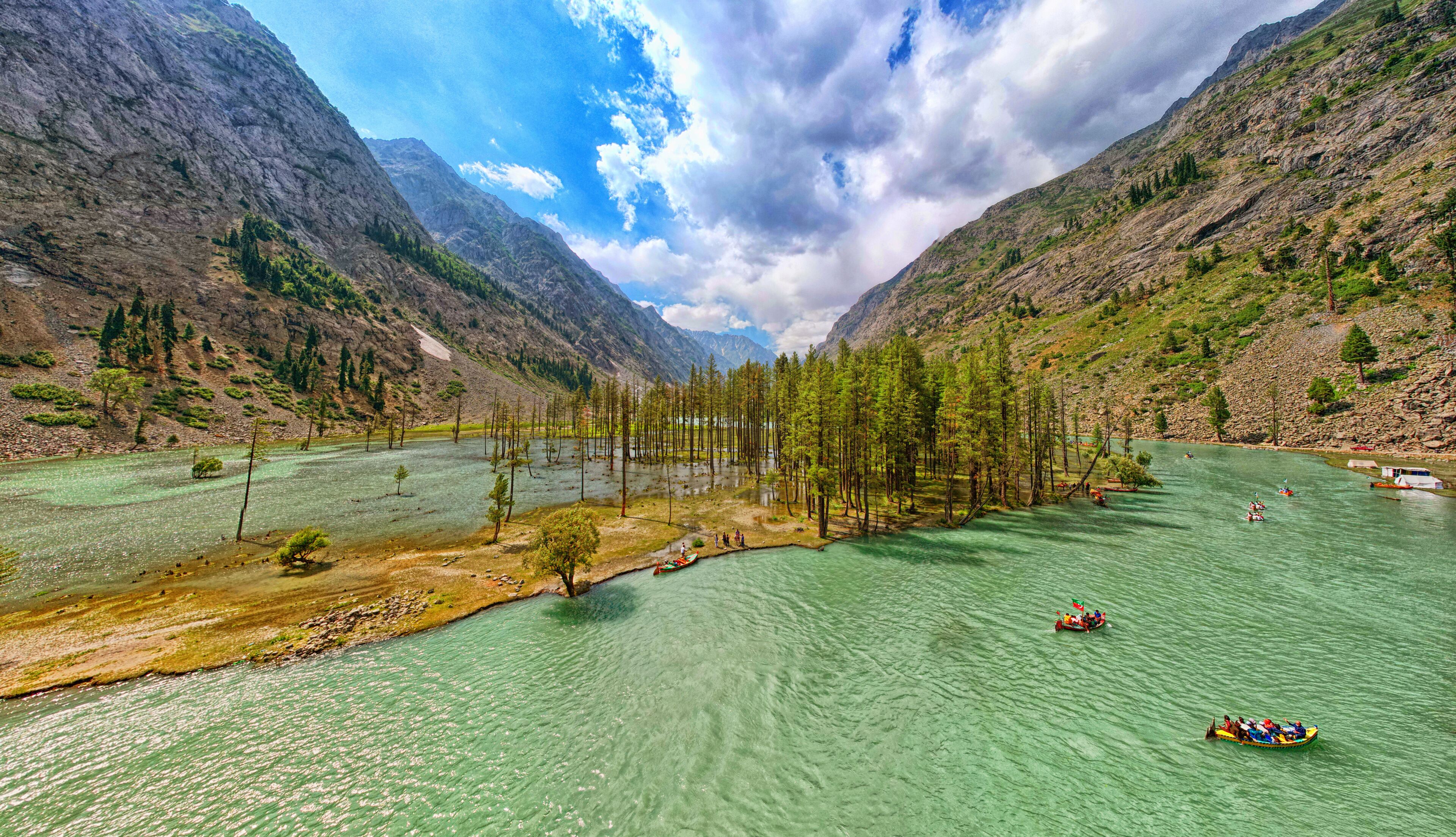 Scenic View of Mahodand Lake with Warm-Toned Trees and Clear Waters