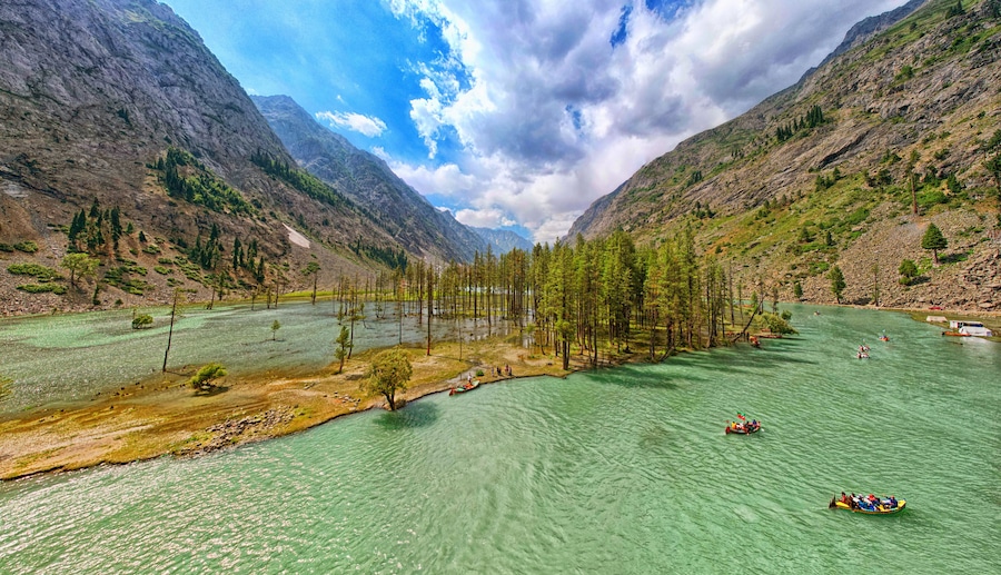 Scenic View of Mahodand Lake with Warm-Toned Trees and Clear Waters