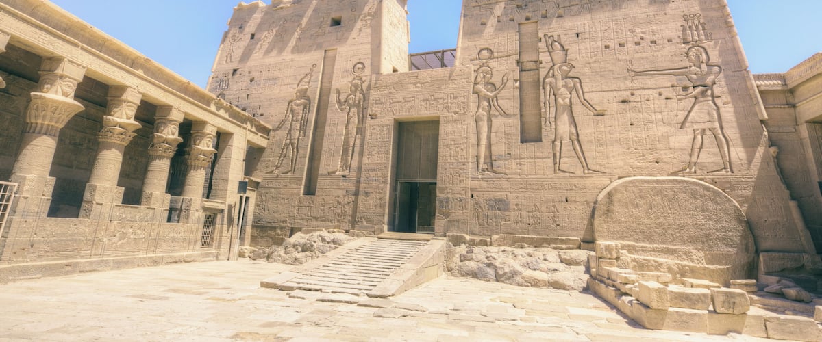 An ancient Egyptian temple with hieroglyphics and columns.