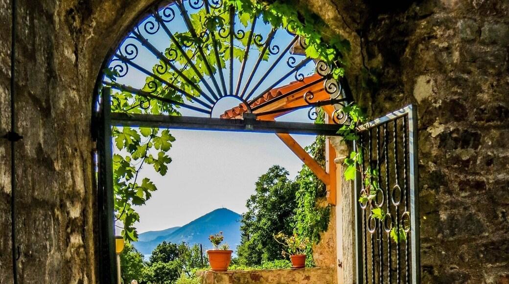 Sveti Stefan is a lovely and tiny island near Budva, Montenegro. This former walled city was converted in a high end hotel, only for deep pocket people. However, it is a beautiful place to visit and it can be seen from the hill. This photo was taken in a monastery near Sveti Stefan.