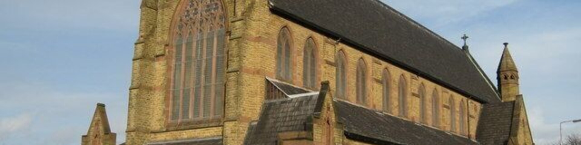 St John the Evangelist, Fountain Road, Kirkdale In 1870 there was no Catholic church in Kirkdale. In 1871 a building which had been a Congregational Chapel was opened for Mass on February 12th by Father Moses Doon (Dawn?)who also began the school in the basement of this little chapel. The Sessions Road school was opened in 1878 and the church itself was not opened until 20th November 1885. The interior is quite impressive with some beautiful stained glass windows and magnificent altars.