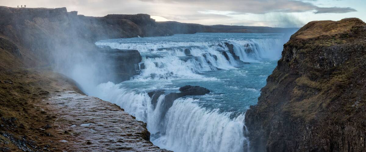A waterfall cascading down a rocky cliff.