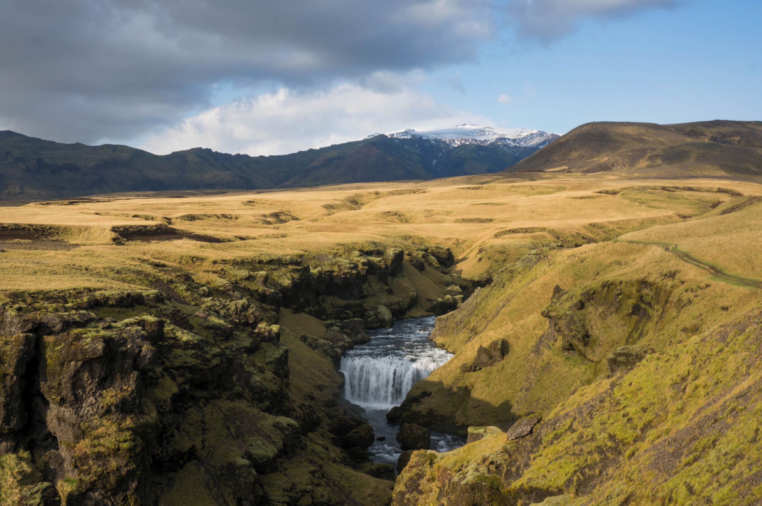 Conquer the 527 steps to the viewing platform at Skógafoss waterfall - gorgeous in and of itself - and over the stile to the trail beyond.  The trail is over 20kms but even a very short day hike on the well marked start of the trail brings you amazing views of waterfalls on the Skoga river and the glaciers beyond. #Bestof5