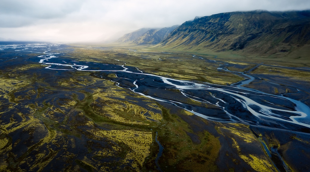 Aerial drone view of large riverbed near Seljalandsfoss waterfall, Rangárþing eystra, Southern Iceland