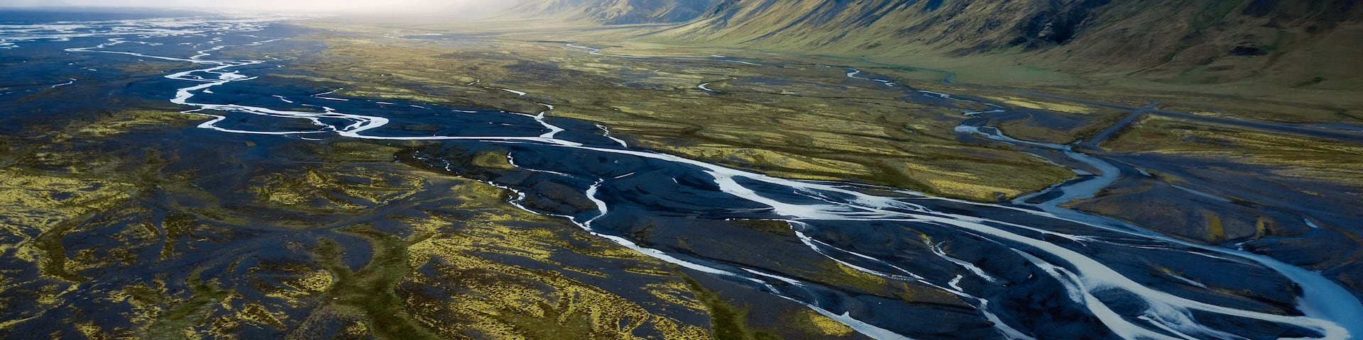 Aerial drone view of large riverbed near Seljalandsfoss waterfall, Rangárþing eystra, Southern Iceland