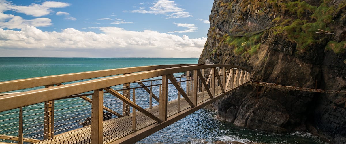 Ballystrudder which includes a bridge and general coastal views