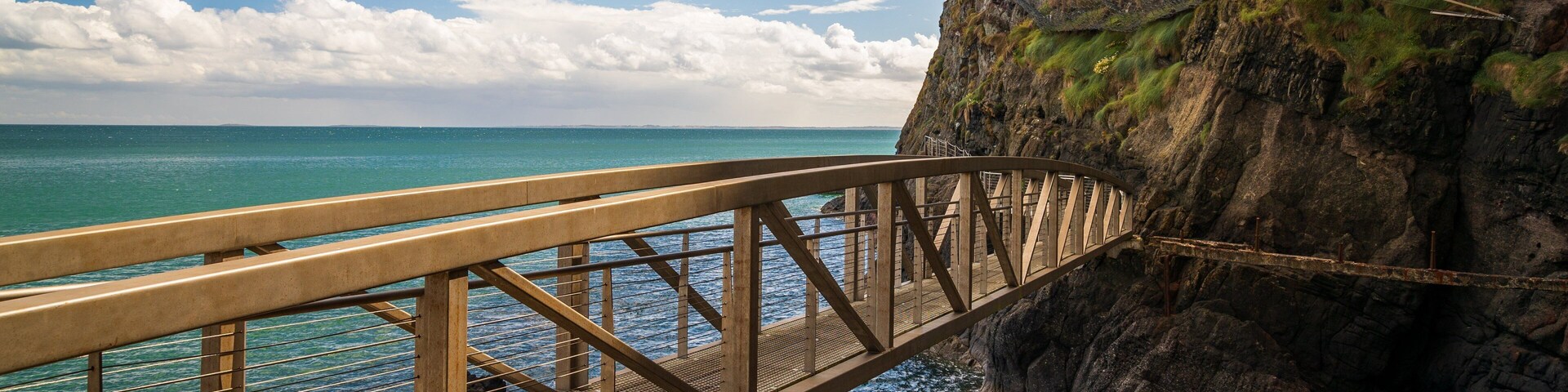 Ballystrudder which includes a bridge and general coastal views
