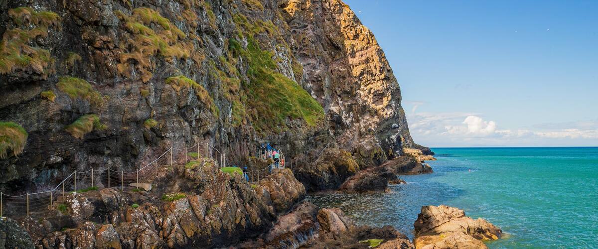 The Gobbins showing rocky coastline and general coastal views