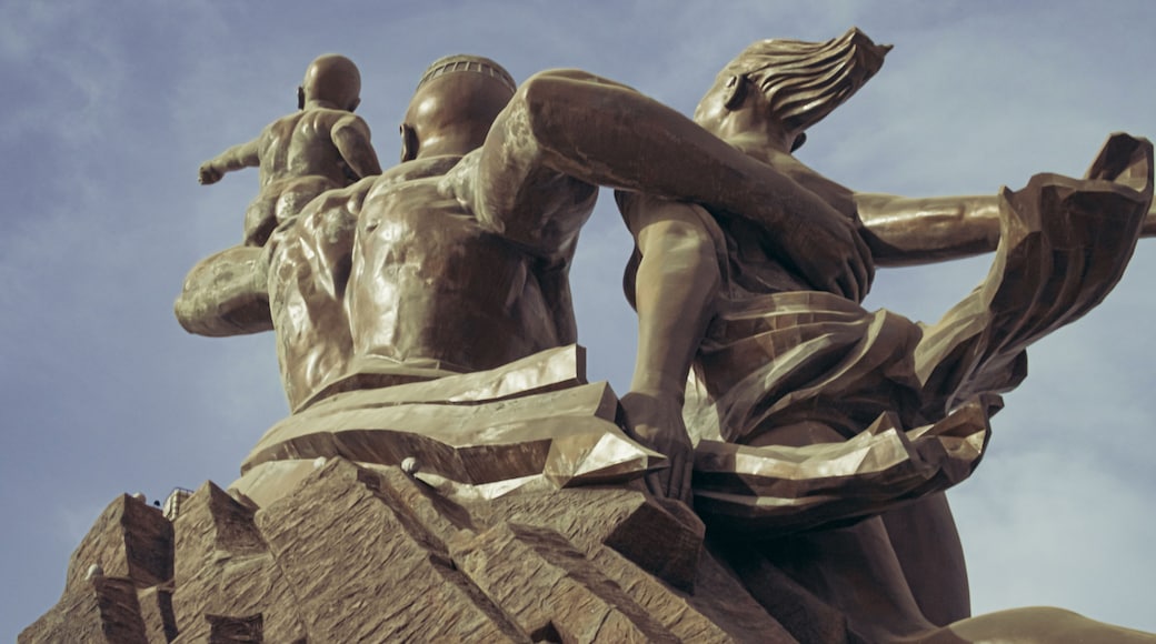 a huge monument on Africa's independence mountain with a view of the city photographed from the throne