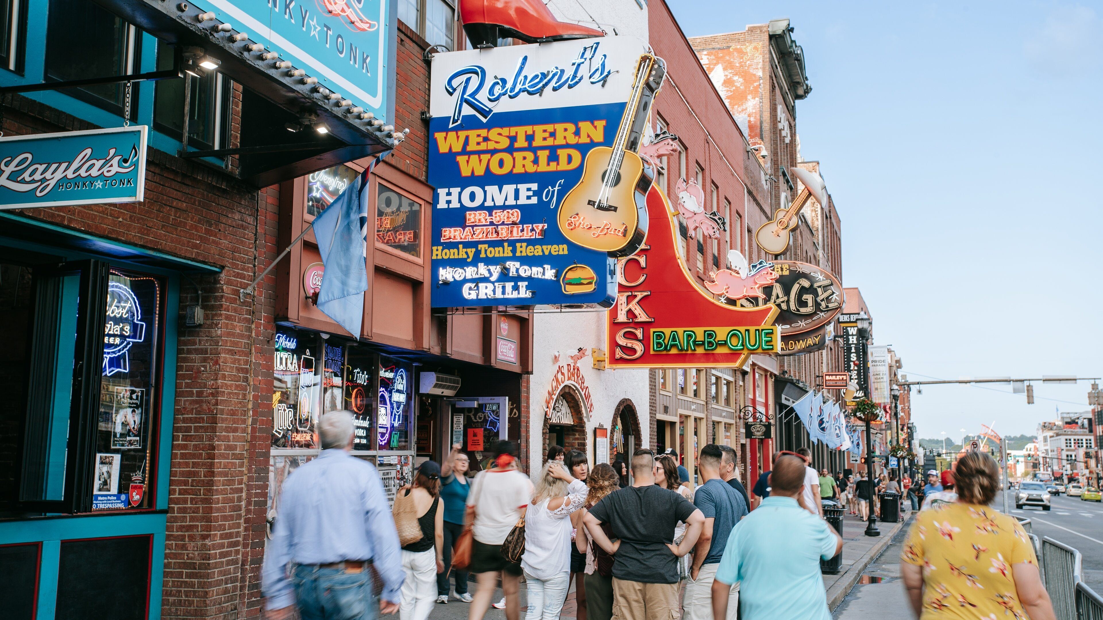 Broadway featuring signage and street scenes