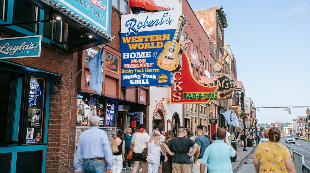 Broadway featuring signage and street scenes