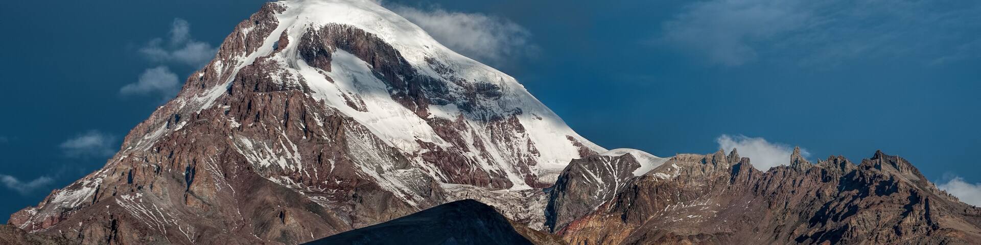 Kazbek mountain in the light of the rising sun