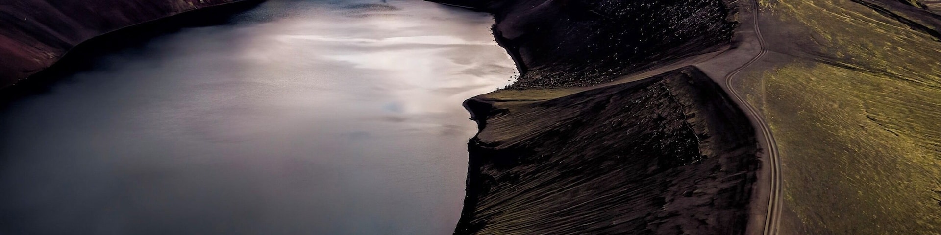 This lake is called in Icelandic the "Ugly Lake". I guess it's a way to ensure this amazing place doesn't attract too many visitors!