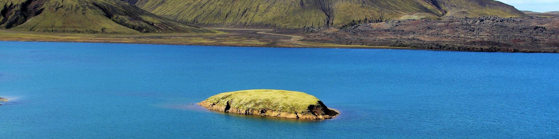 Frostastaðavatn is a lake in the Highlands of Iceland, not far from the famous mountains of Landmannalaugar and the volcano Hekla. Frostastaðavatn is Icelandic for "lake of the frosty place". No frost there in early September, but I can only imagine what it looks like in Winter! Anyone going to Landmannalaugar should definitely make a stop here. The views here and near this location are stunning and otherworldly!