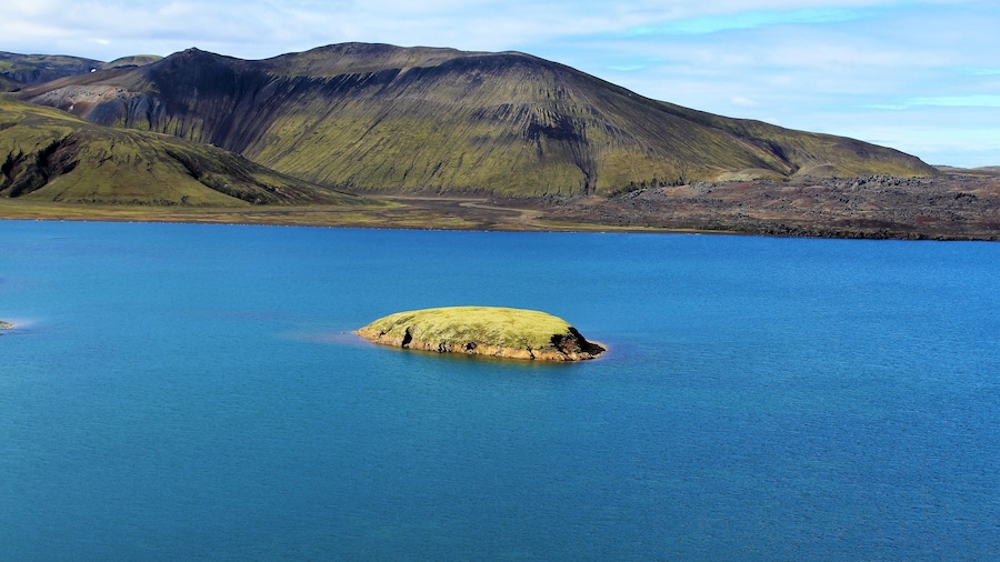 Frostastaðavatn is a lake in the Highlands of Iceland, not far from the famous mountains of Landmannalaugar and the volcano Hekla. Frostastaðavatn is Icelandic for "lake of the frosty place". No frost there in early September, but I can only imagine what it looks like in Winter! Anyone going to Landmannalaugar should definitely make a stop here. The views here and near this location are stunning and otherworldly!