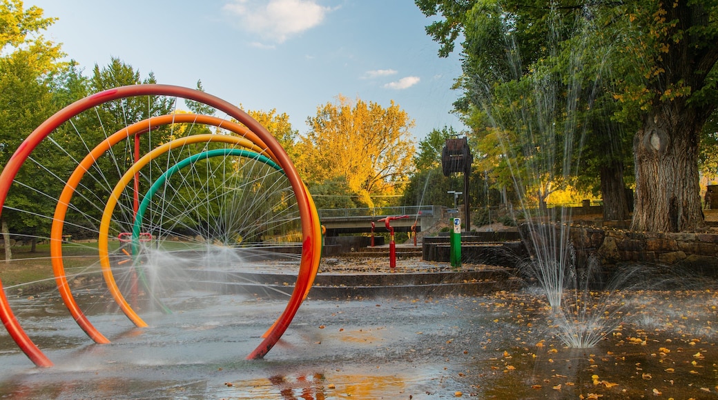 Bright Splash Park featuring a fountain
