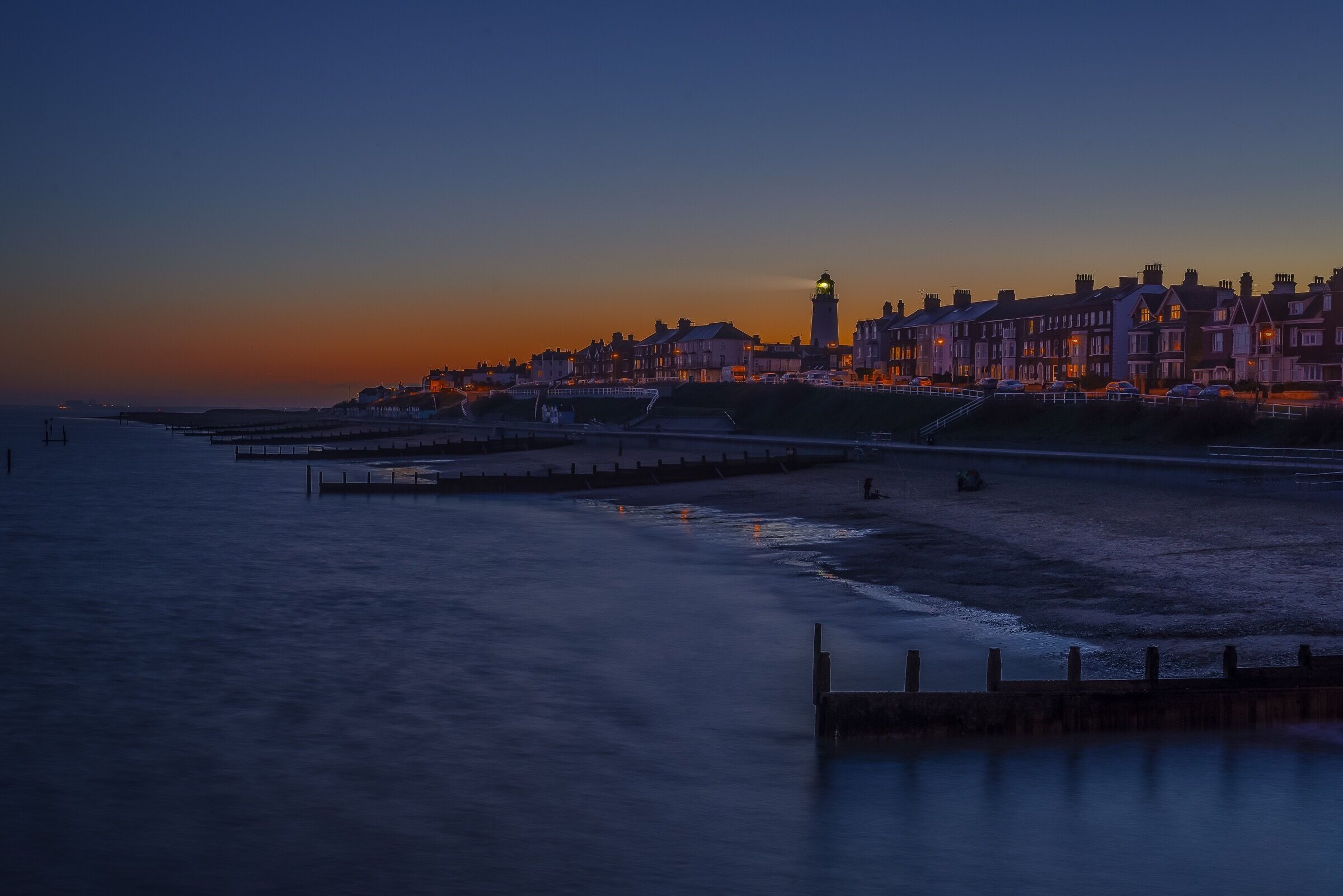 Southwold is described as the jewel of Suffolk's Heritage Coast, and it does not disappoint. 
With its famous pier, lighthouse and beach huts, Southwold is certainly one of the most popular resorts in East Anglia. 
Granted a Royal Charter back in 1489 by Henry VII, Southwold has a fascinating history and many links with the past can still be seen all over the town. 
The centre piece is the magnificent church, with its 100 foot tower and dedicated to the last king of East Anglia, St Edmund. Nearby, the lighthouse, also 100 feet tall, has given safe passage to sailors and fishermen since 1890.
The pier and its history are closely connected to that of Southwold. Its original use was, of course, practical – it was a landing stage for the steamships which arrived from London Bridge.

#uk #britain #suffolk #england #coast #sea #pier #coastal #seaside #sunset #lighthouse #history