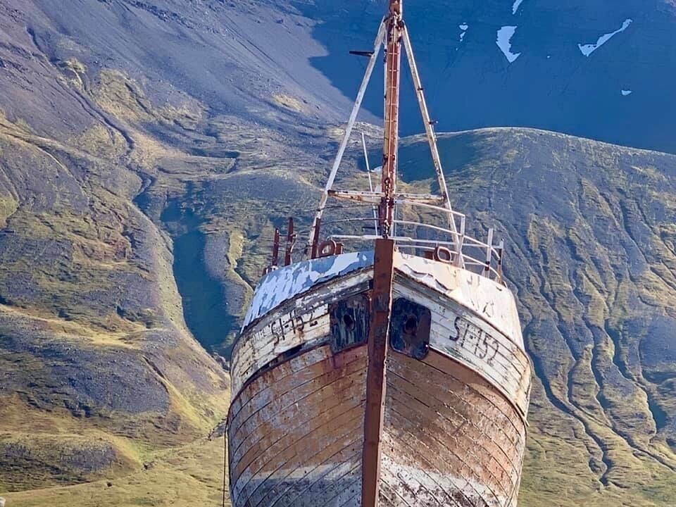 Per my friend Pam:
“Iceland might be the single most photogenic place I have ever been. Angled light all day long, no trees to block the view, and every so often, a beached herring boat.”