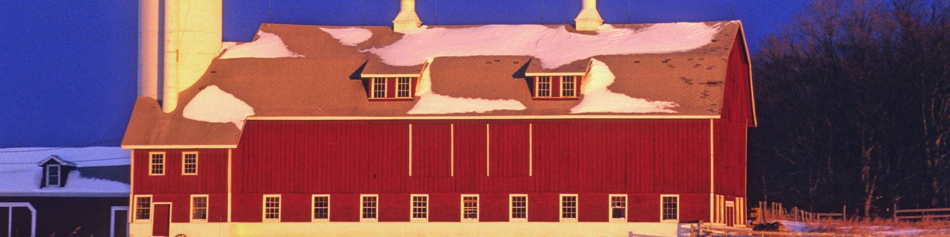 418-51 Red Door County barn in winter with sunset light