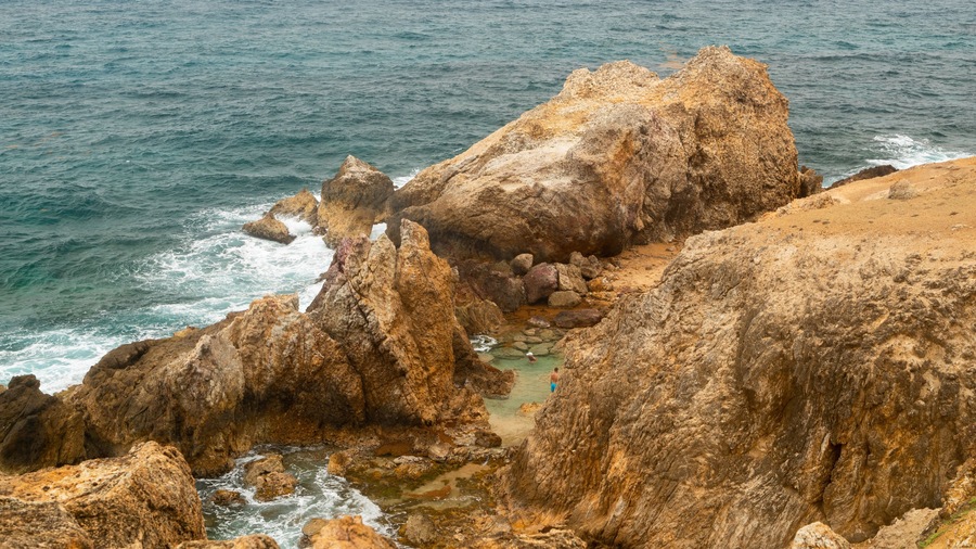 Grand Fond which includes rugged coastline and general coastal views