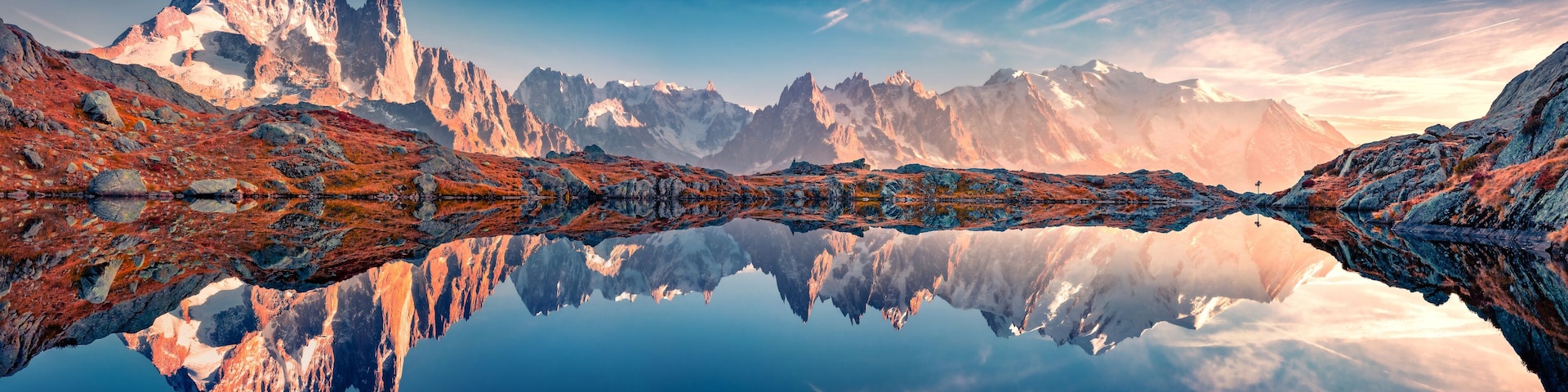 Panoramic autumn view of Cheserys lake with Mount Blank on background, Chamonix location. Spectacular outdoor scene of Vallon de Berard Nature Preserve, Alps, France, Europe.