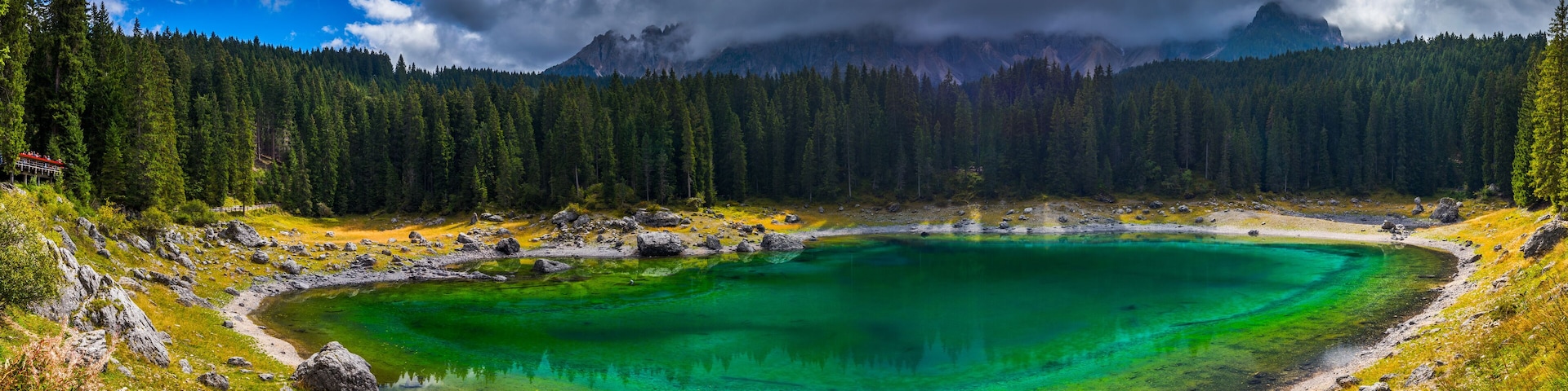 Carezza lake (Lago di Carezza, Karersee) with Mount Latemar, Bolzano province, South tyrol, Italy.