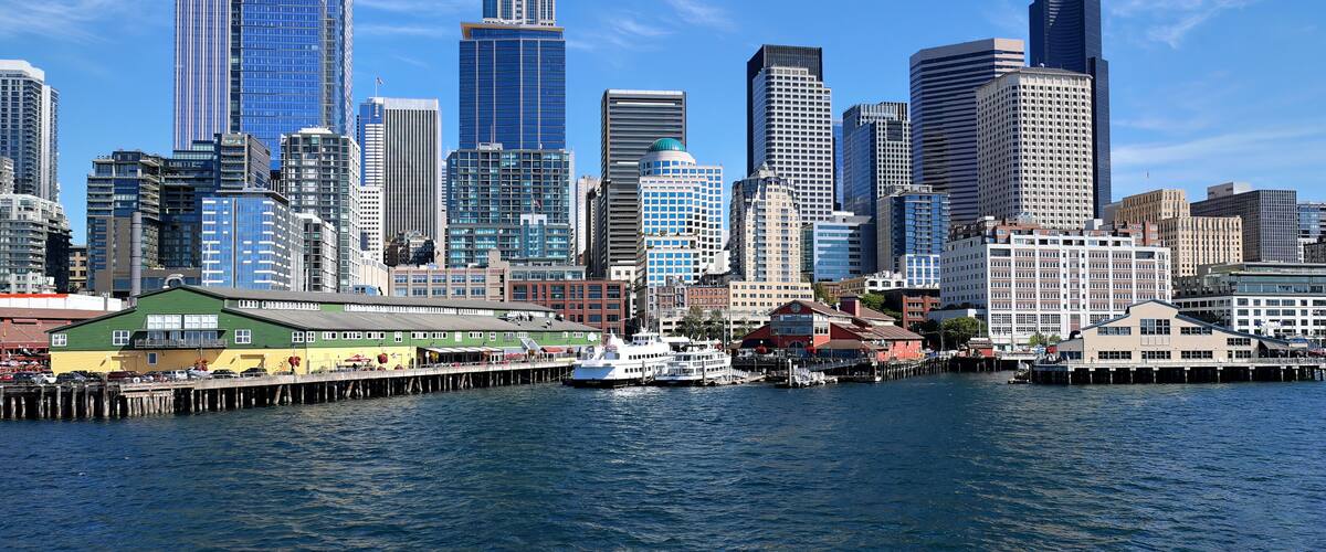 Panoramic view of Seattle Bell Harbor Marina and Seattle financial downtown skyline panorama.