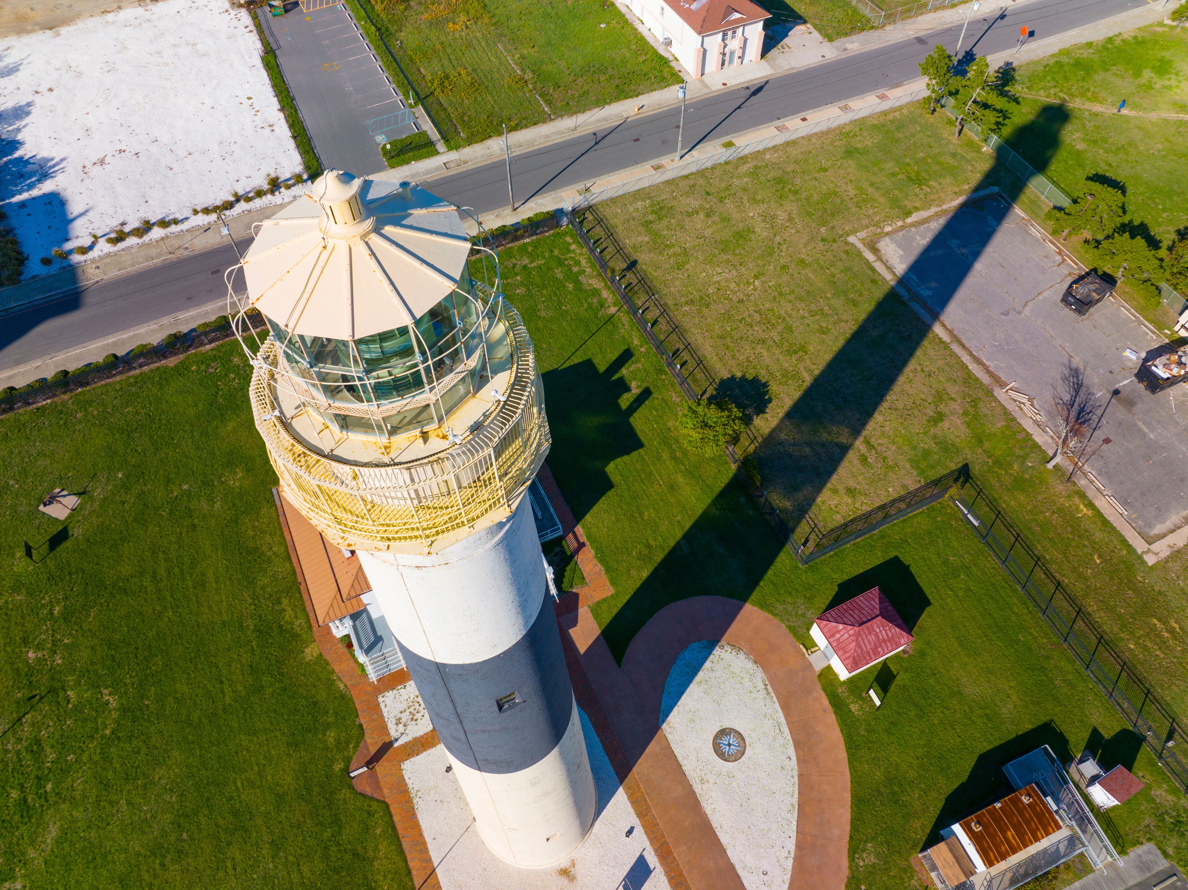 Absecon Lighthouse aerial view at the mouth of Absecon Inlet in the north end of Atlantic City, New Jersey NJ, USA. The light house was built in 1856 and is the tallest Lighthouse in New Jersey. 