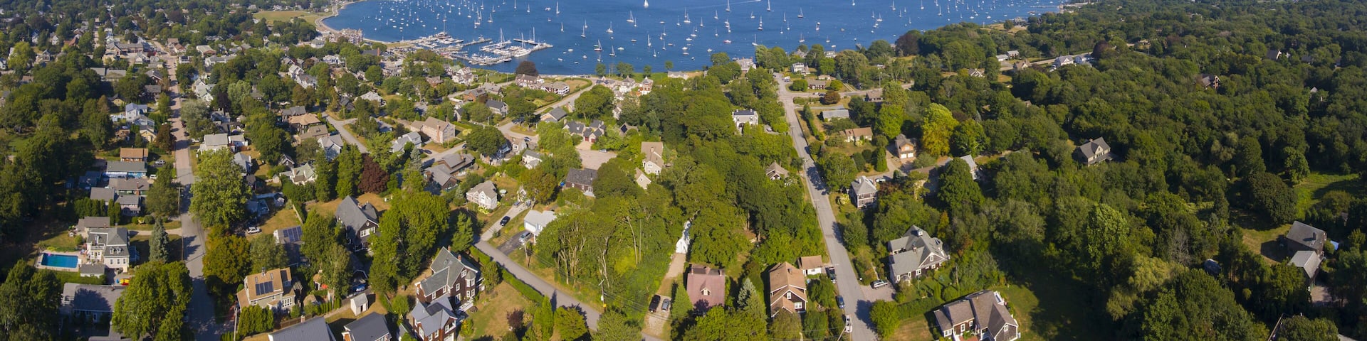 Claiborne Pell Newport Bridge on Narragansett Bay and town of Jamestown aerial view in summer, Jamestown on Conanicut Island, Rhode Island RI, USA.