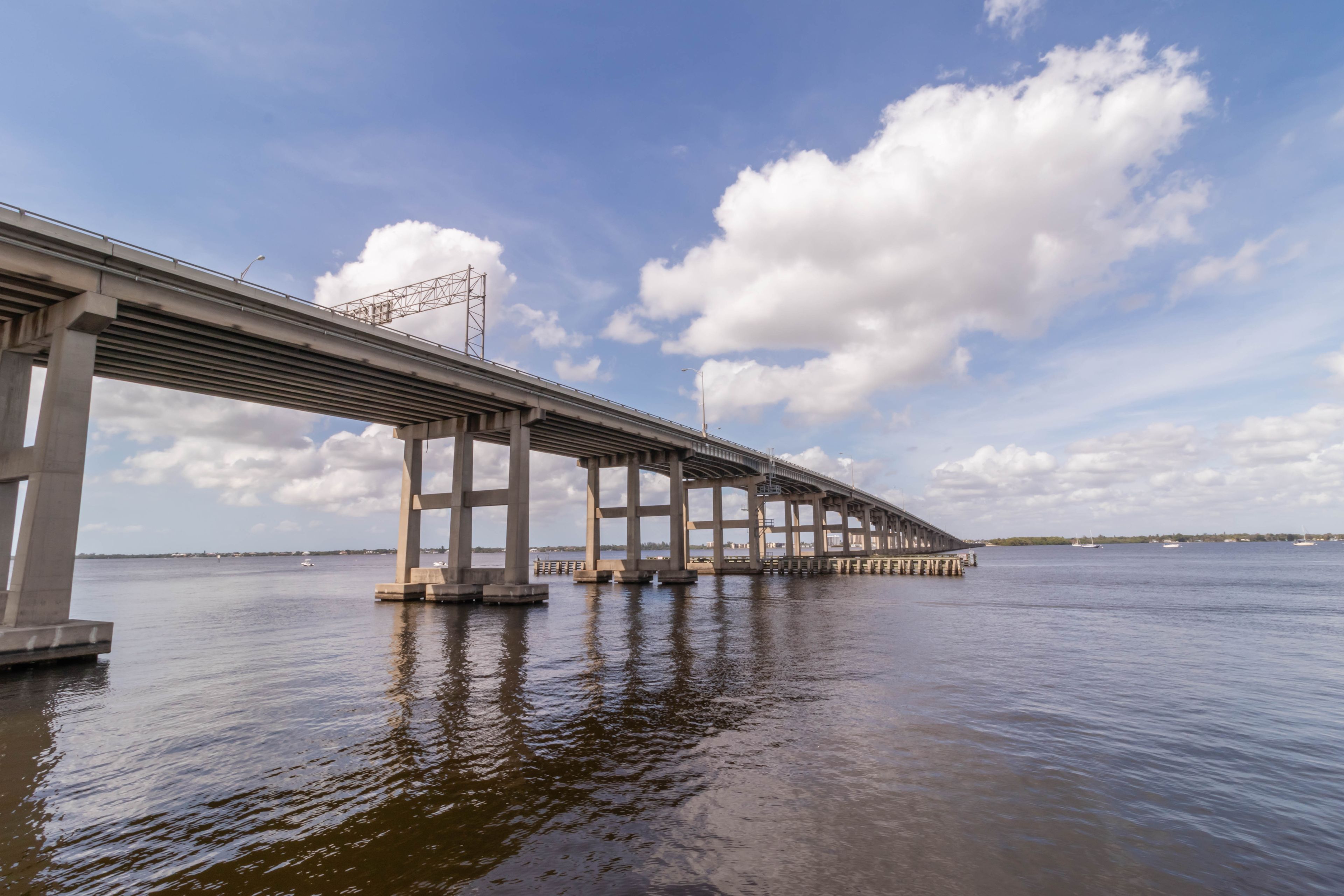 Landscape of the Edison bridge going over the Caloosahatchee River this bridge connects Cape Coral to Fort Myers Florida shot from centennial park peir