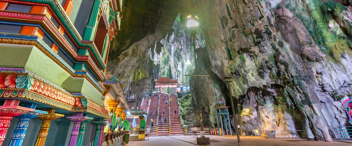 The huge interior of Batu Caves,and the Hindu temple inside,Kuala Lumpur,Malaysia.