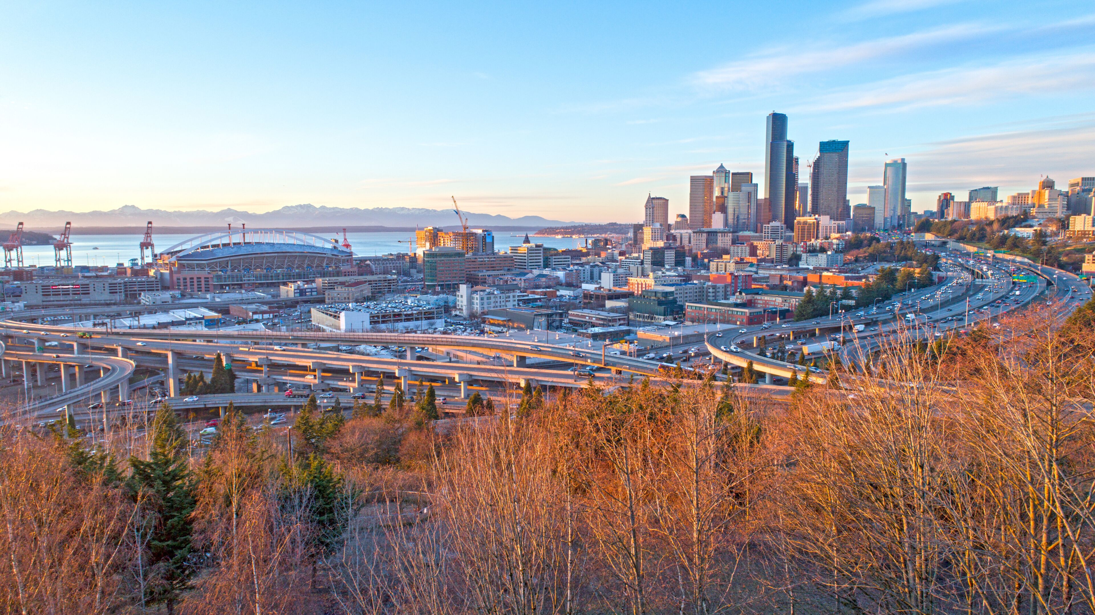 Seattle Downtown City View at Sunset Olympic Mountains Elliot Bay Skyline