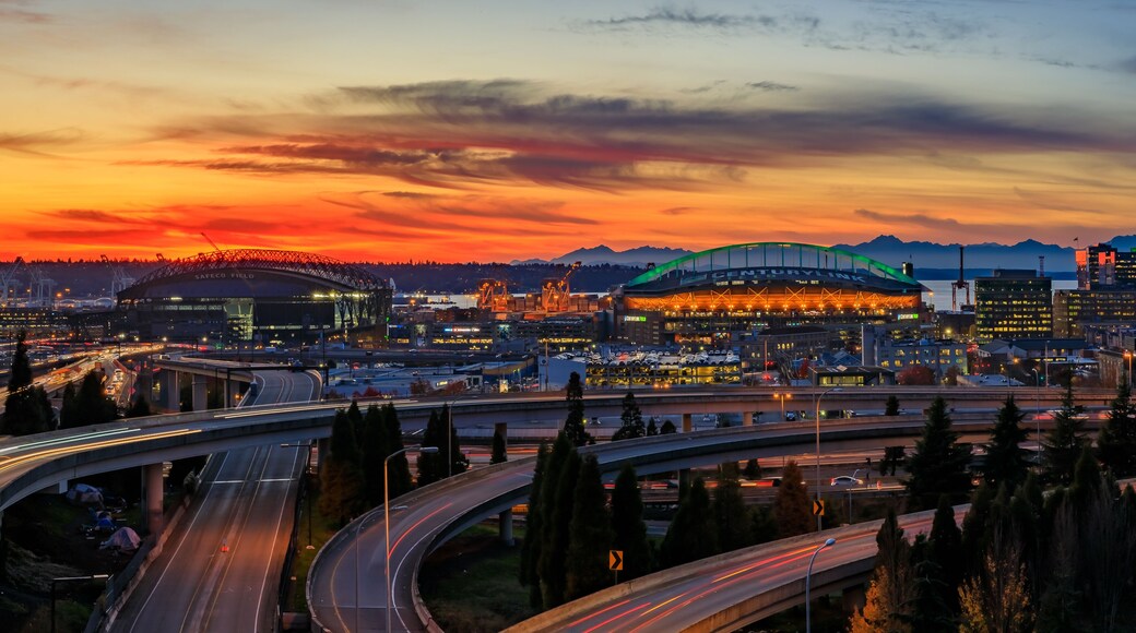 Seattle downtown skyline panorama at sunset from Dr. Jose Rizal or 12th Avenue South Bridge with traffic trail lights